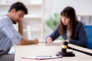 Child Rape Defense lawyer in a consultation with their client