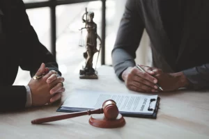 federal pornography defense lawyer sitting down with client in free consultation