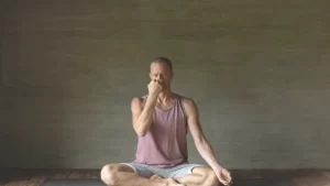 person doing yoga managing their stress and anxiety after a dui charge