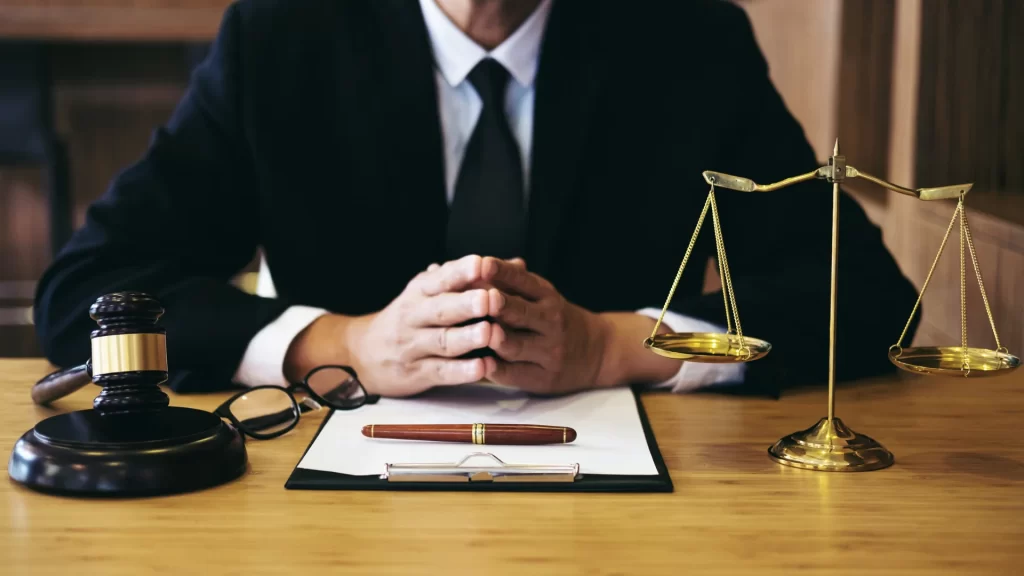 a sex crimes defense lawyer from Cincinnati sitting at his desk reviewing his client's sex crime case documents